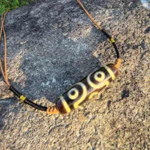 Tibetan Cross Vajra Six-Eye Dzi Pendant on Hand-Woven Waxed Cord with Golden Coil Accents | Kris Nature
