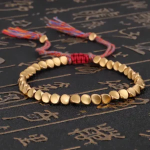 Grounding Tibetan Copper Bead Bracelet with heritage cotton cord by Kris Nature