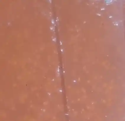 Fracture filling in red agate