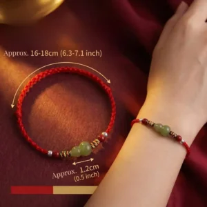 Jade gourd red string bracelet shown on wrist with size details, approx 16-18cm adjustable length