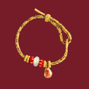 Kris Nature Vajra Knot Blessing Bell Bracelet with golden five-color cord, clear quartz donut bead, and gold-plated copper charm