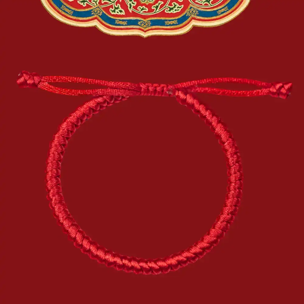 Handwoven red nylon cord bracelet with adjustable sliding knot